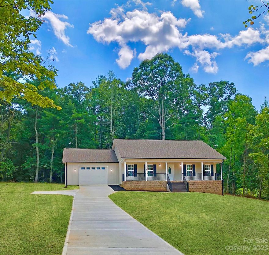 Stunning New Construction.  Main Level Living with a spacious open floor plan.  This 3 bedroom/2 full bath home is perfect and waiting for you.  Walk up the front steps to the rocking chair front porch and look out to the beautiful property and the perfect concrete driveway.  Enter the living room with recessed lighting and head over to the well appointed kitchen w/great cabinets and counter space.  Dining room space is abundant so get ready for entertaining.  Want to spend time outdoors?  Walk out the French doors to the large back deck and check out the great view of trees surrounding the property.  The primary suite has a walk-in closet and a wonderful primary bath w/tiled shower. The hall closet offers additional storage. The 2nd and 3rd bedrooms have a great view of the back yard. This is the perfect place to call home.  Enjoy your life in the foothills of our mountains and have the best weather with a short drive to the ski slopes.  Welcome to your new home.