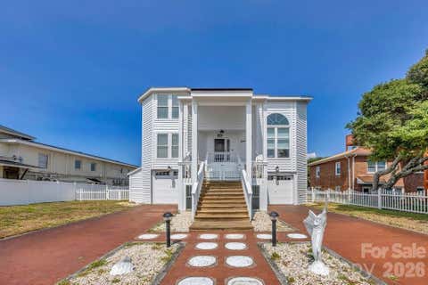 Photo of 203 Norton Street, Oak Island, NC 28465 (MLS # 4405694)