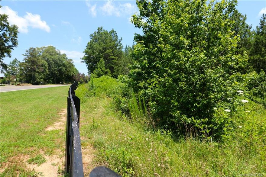 Your chance to own 5.12- acres in Olde York Farms.  Lots are lined with black wood fencing. Active HOA. Short drive to Lake Wylie area, York, and Rock Hill. very private. Build your dream home with your builder. Livestock welcome with some restrictions. 300 initial HOA with 51 per acre per year. Last LOT on ADKINS! SURVEY HAS BEEN COMPLETE ON THIS LOT LOT IS MARKED. Please email agent for all documents associated with purchasing this lot. 
Thank you