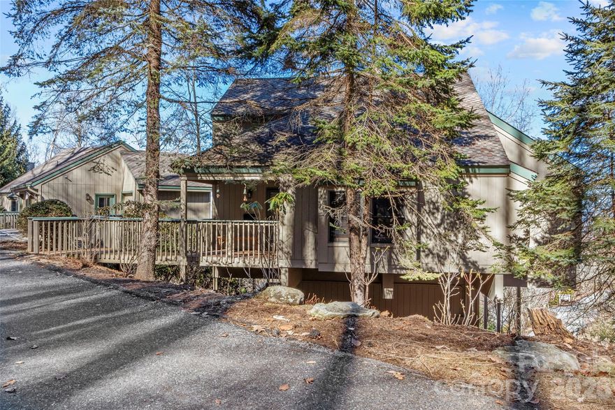 This beautifully updated, fully furnished home, is close to the top of MOUNTAIN AIR in the Ivy Ridge neighborhood. The open floor plan has lovely wood floors, wood ceilings, and wood beams. The great room, kitchen, and laundry room are on the main floor, as are two of the four bedrooms in this home. The Primary Bedroom en Suite offers a steam shower. There is a spacious deck on the main level for relaxing and mountain views.  The renovated Loft upstairs featuring hickory flooring and tongue and groove ceiling is a game room/theater room/billiard room, but can be another bedroom suite with full bath. Downstairs Guest Room has full bunk beds, sitting area, full bath, a bonus bedroom, and covered deck. Detached one-car garage and separate golf cart garage. Convenient to Club amenities  (available with membership) and activities--golf, tennis, dining, pickleball, hiking, fitness center, Mountain Market, golf learning center, and more. This home is priced furnished, with a few exceptions.