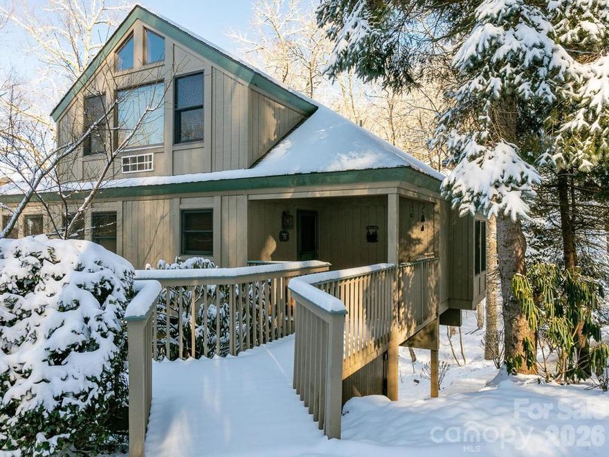 This beautifully updated, fully furnished home, is close to the top of MOUNTAIN AIR in the Ivy Ridge neighborhood. The open floor plan has lovely wood floors, wood ceilings, and wood beams. The great room, kitchen, and laundry room are on the main floor, as are two of the four bedrooms in this home. The Primary Bedroom en Suite offers a steam shower. There is a spacious deck on the main level for relaxing and mountain views.  The renovated Loft upstairs featuring hickory flooring and tongue and groove ceiling is a game room/theater room/billiard room, but can be another bedroom suite with full bath. Downstairs Guest Room has full bunk beds, sitting area, full bath, a bonus bedroom, and covered deck. Detached one-car garage and separate golf cart garage. Convenient to Club amenities  (available with membership) and activities--golf, tennis, dining, pickleball, hiking, fitness center, Mountain Market, golf learning center, and more. This home is priced furnished, with a few exceptions.