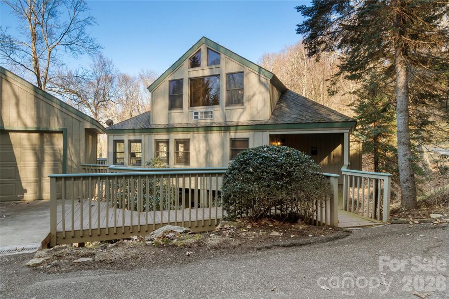 This beautifully updated, fully furnished home, is close to the top of MOUNTAIN AIR in the Ivy Ridge neighborhood. The open floor plan has lovely wood floors, wood ceilings, and wood beams. The great room, kitchen, and laundry room are on the main floor, as are two of the four bedrooms in this home. The Primary Bedroom en Suite offers a steam shower. There is a spacious deck on the main level for relaxing and mountain views.  The renovated Loft upstairs featuring hickory flooring and tongue and groove ceiling is a game room/theater room/billiard room, but can be another bedroom suite with full bath. Downstairs Guest Room has full bunk beds, sitting area, full bath, a bonus bedroom, and covered deck. Detached one-car garage and separate golf cart garage. Convenient to Club amenities  (available with membership) and activities--golf, tennis, dining, pickleball, hiking, fitness center, Mountain Market, golf learning center, and more. This home is priced furnished, with a few exceptions.