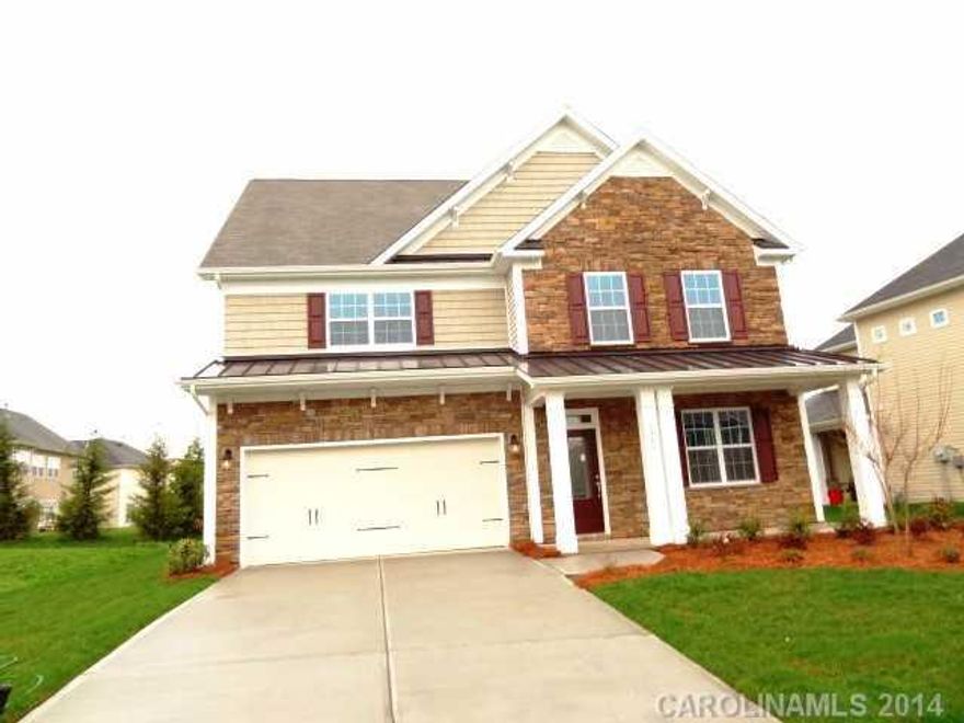 Gorgeous - this one is one of those rare finds - heavy molding including deluxe crown, base & wainscoating throughout the first floor - arches, stainless appliances, double wall oven and separate cooktop; hardwood floors, tile in master bath - granite tops in kitchen and ALL the baths -  screen porch off the kitchen leading to a private rear yard - Don't let this one get away