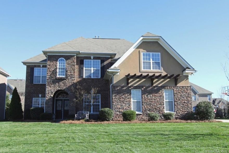 Gorgeous all brick & stone home w/3 car garage w/built in loft storage, convenient to nearby shopping, Top Rated Schools,HUGE recreational/gameroom w/walk n closet/could be used as a 6th bedrm . Downstairs n law suite/office w/ full bath connecting. Lg walk n closets n home, Beautiful Formal LR & DR perfect for entertaining. Gourmet kit/brkfst w/ss appliances, gas cooktop, silestone countertops, DBL ovens.  Tons of upgrades w/ wrought iron staircase. Fenced/ flat backyard w/extended stone patio.