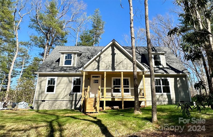 Welcome to Cascade Ridge, one of Western NC's newest communities! This new construction is built in a modern farmhouse aesthetic and offers an expansive front porch, spacious rear deck, hardboard siding, and mountain views. The interior boasts an open floorplan, kitchen island, laundry room, and a beautiful owner's suite with a walk-in closet & freestanding tub. There is also room to grow and let your DIY imagination come alive with an unfinished upper level with 996 sqft. of space and stairs in place to connect. Located in Fairview, just a short drive from downtown Asheville, independent coffee shops, local breweries, and eclectic restaurants will be some of your new and closest neighbors! The neighborhood allows short-term rentals. Call to schedule your appointment!