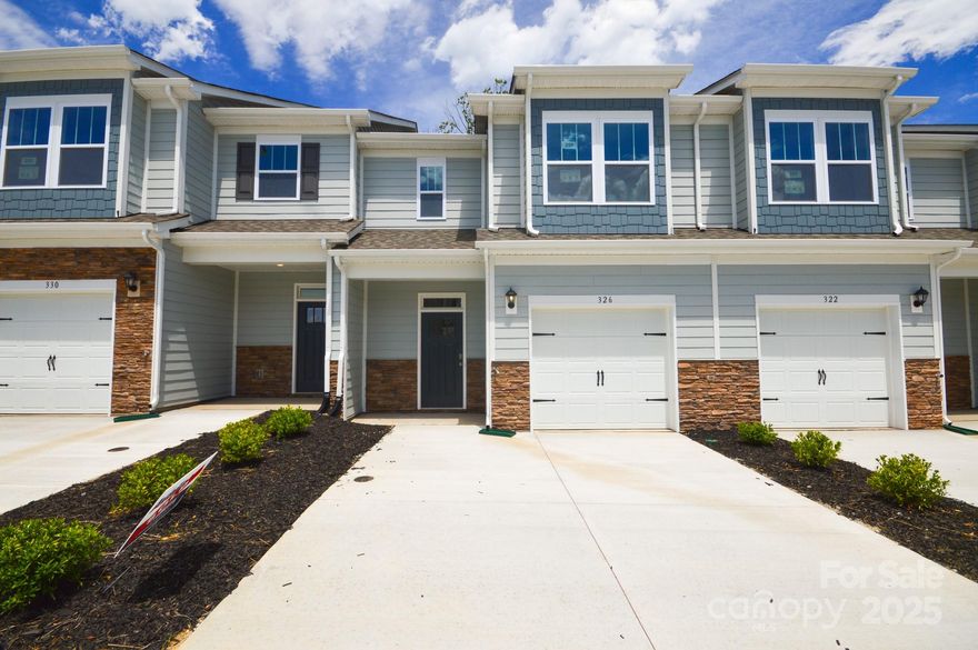 Enjoy simple living with our new construction townhomes! This floorplan offers a large kitchen complete with island, ss appliances and tile backsplash, an open living area and plenty of storage space. The primary suite with attached bath, along with two other bedrooms can be found on the second floor. Laundry is also located on the upper floor for convenience. Private back patio and one car garage complete this floorplan and make it a home! *Home features are subject to change without notice. Internet service not included. Sq footages are approximate*