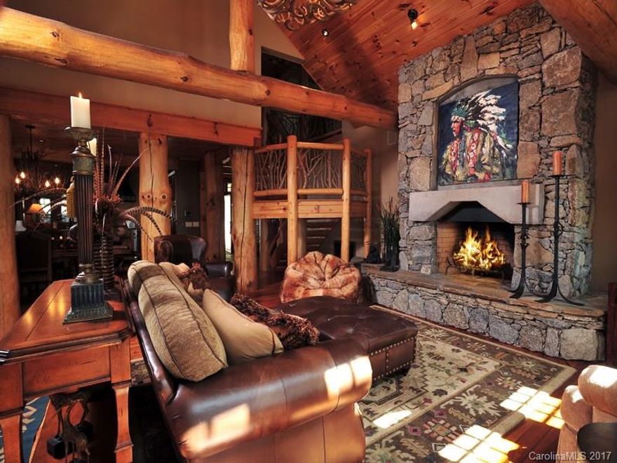 The perfect location at Eagles Nest! Sitting at 4700', Four Feathers is an Eagles Nest Original Signature Home on 10 private acres in the highly desirable Lodges at Eagles Nest. Relax on the spacious screen porch with outdoor kitchen and wood burning fire place or soak in the hot tub and take in the spectacular sunsets.    

This home is beautifully built and meticulously maintained. Enjoy this quintessential, one-of-a-kind estate in Banner Elk,North Carolina and create a lifetime of memories.