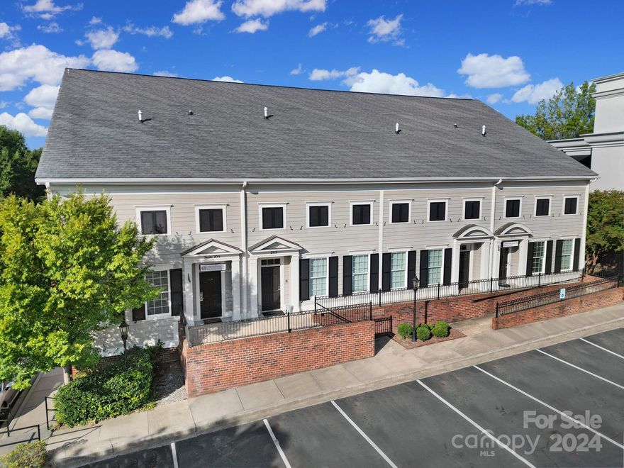 Rare opportunity to own a move in ready office condo in Baxter Village located just off I-77, with easy 15 mile drive to Uptown Charlotte. This condo offers seven offices, two restrooms, reception area, full kitchen and a conference room. Freshly painted, and well maintained this unit is available for immediate occupancy. Fort Mill is currently being recognized as one of the fastest growing towns in the US and opportunities to own a condo in this sought after development are rather limited. Baxter village is surrounded by a 1000 acre residential development featuring over 1500 homes and a mixed use town center with over 250,000 square feet of restaurants, shops, and offices.