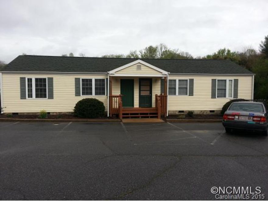 Check out Deep West Asheville and discover the great value of this home. Want to downsize, retire, have a second home and have passive income? Live in one side and rent the other.  Create your own intentional community by having your friends buy surrounding duplexes.  Avoid city taxes and still be close to downtown Asheville - approx. 15 mins.  Each side of duplex has 2 BR and 1 BA. Common area for green space and community gardening.