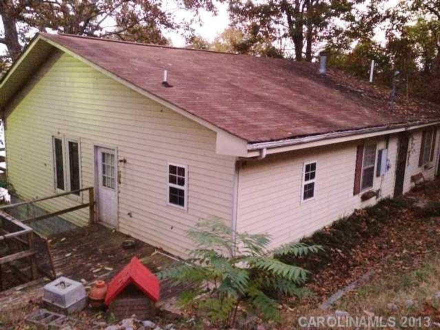 168 feet on the main channel with stunning views. Seller will not make repairs making this a handyman's dream home with list price is below tax value.