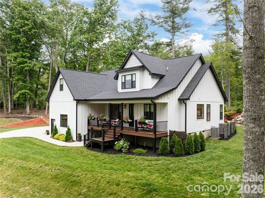 This home is architecturally curated, surrounded by nature, views and privacy. Elevated mountain living presents 2,836 square feet, combining custom craftsmanship with contemporary design on a double lot. The spacious primary suite, located on the main level, features expansive windows framing breathtaking waterfall views. The chef’s kitchen features quartz, Italian luxury backsplash, upgraded cabinetry, porcelain sink and a custom pantry, complemented by vaulted ceilings and designer lighting. A new, custom fireplace wall has a linear setting and is surrounded by tile. The interior highlights European oak hardwood, a bright office with custom built-ins, a bonus room, a reading area and expanded storage. Outdoor living features covered front and back composite decking, a soothing custom waterfall with pond, flagstone fire-pit, professionally landscaped grounds with extensive grading with natural stone. A whole-home water filtration security system is in place. Call me for complete features and a 48-hour viewing notice. See Video.