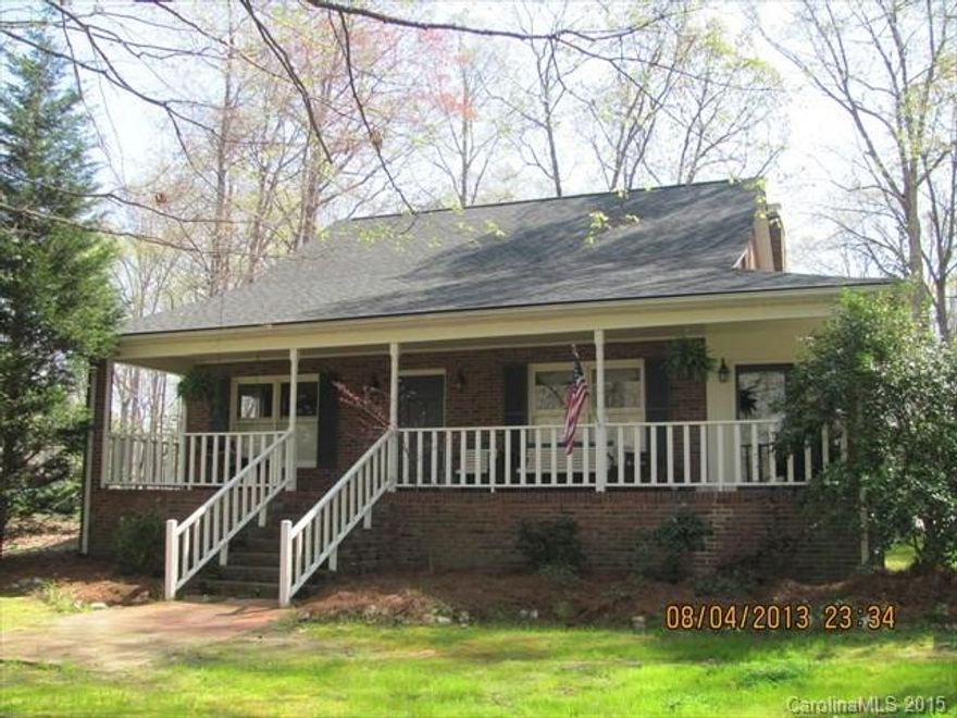 Walk to the golf course from Spring Lake Estates.  This beautiful 3 bedroom/2.5 bath brick home features a masonry fireplace, formal dining room, formal living room, den and sun room.  Master bath features whirlpool tub, separate shower.  Beautiful level wooded lot.  Rocking chair front porch.  Home has been beautifully maintained.  Call today to see this special home.