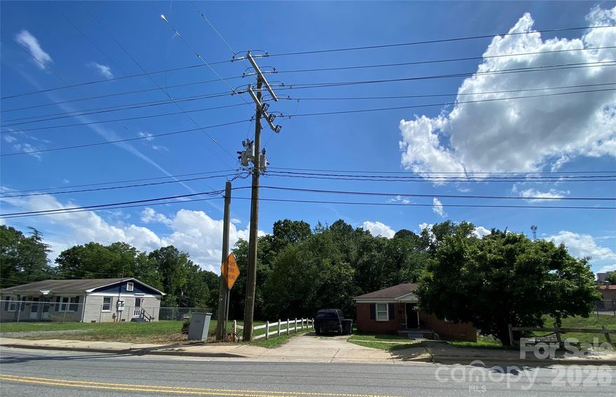 Great Redevelopment Opportunity In Hot Graham Heights that's next to Camp North End!!  .54 Acres 121ft wide & 200 ft deep lot this lot has zoning that allows for exciting redevelopment options. 2 lots Same owner for 805 & 809 Norris Ave!!   View attached pics of completed projects that are right across the street, also ones just a block away. The existing home, a small 2 bed 1 bath brick house on it with a month to month tenant.