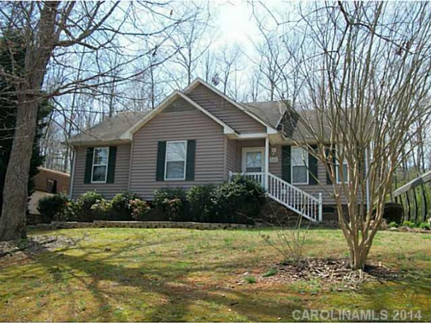 This charming and cozy 3 bedroom 2 bath home offers privacy among the trees and a great view from the front. The dining/kitchen combo is large with plenty of cabinets and counter space. Enjoy the private back patio, perfect for outside entertaining.  Close to schools and convenient to Lake Tillery.