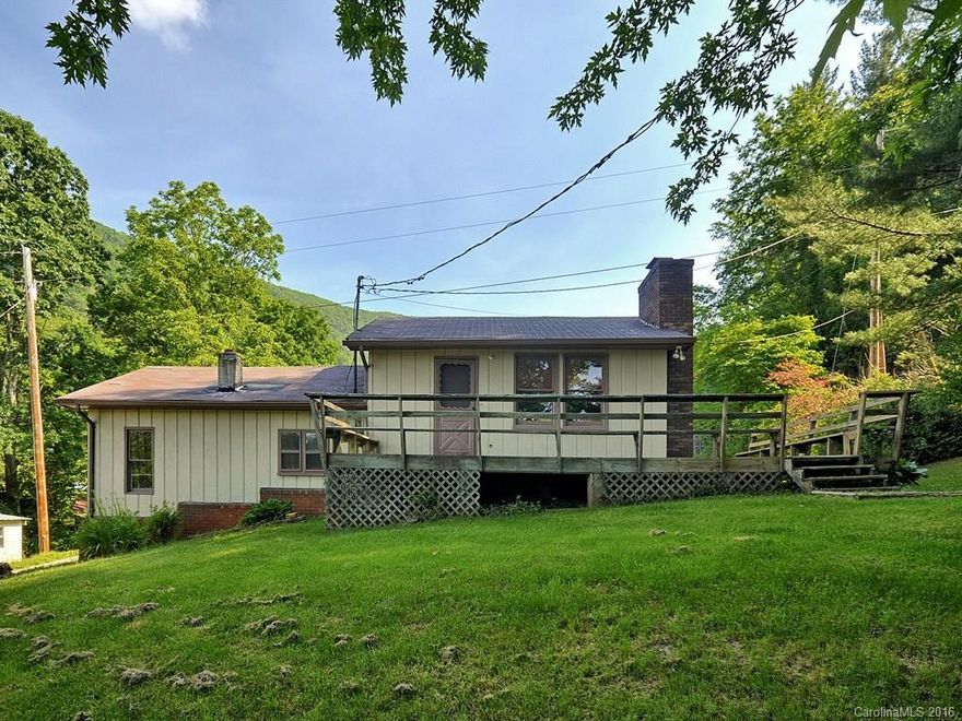 Enjoy living in the country, but still enjoy being close to town.  Add your personal touches to make this split level home with mountain views your very own.  Less than 3 miles from Exit 33 and I-40. Includes additional PIN: 8678-18-7413 and detached 3 car garage/workshop.  Easy to show!