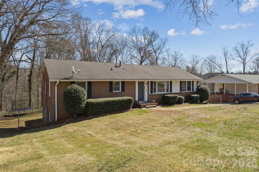 Solid Mid-Century Character with Unmatched Utility in Belmont

If you appreciate the "built-to-last" era of 1961, this Belmont home is a must-see. Located just minutes from I-85, it offers the kind of structural integrity and expansive footprint rarely found today. While the home is ready for your updates and personal touch, the "bones" are undeniably impressive.

The Hobbyist’s Dream & Storage Powerhouse:
This property is a standout for anyone needing serious workspace. The lower level features an extensive interior workshop and a massive dedicated storage area, complemented by a large detached exterior shed for equipment or overflow. Whether you’re a maker, a collector, or just have a lot of gear, you won't run out of room here.

Versatile Living & Space:

Flexible Layout: Features 5 bedrooms (note: septic permit is for 4) and significant flex space for a home gym or crafting.

Dual Living Quarters: The lower level includes a full second living area with a kitchen, bath, and two private entries—perfect for multi-generational living or "boomerang" kids. Or you could even rent the space and generate additional income. 

Original Details: You’ll find original hardwood floors throughout the main level (excluding kitchen/baths) and refinished cabinets with their authentic vintage hardware. Bathrooms have been updated but still maintain mid-century modern appeal.

The backyard offers a unique topography, sloping down to a flat expanse with plenty of room for a future pool. All appliances remain with the home. This is a rare opportunity to secure a high-utility property with mid-century soul in a prime location.