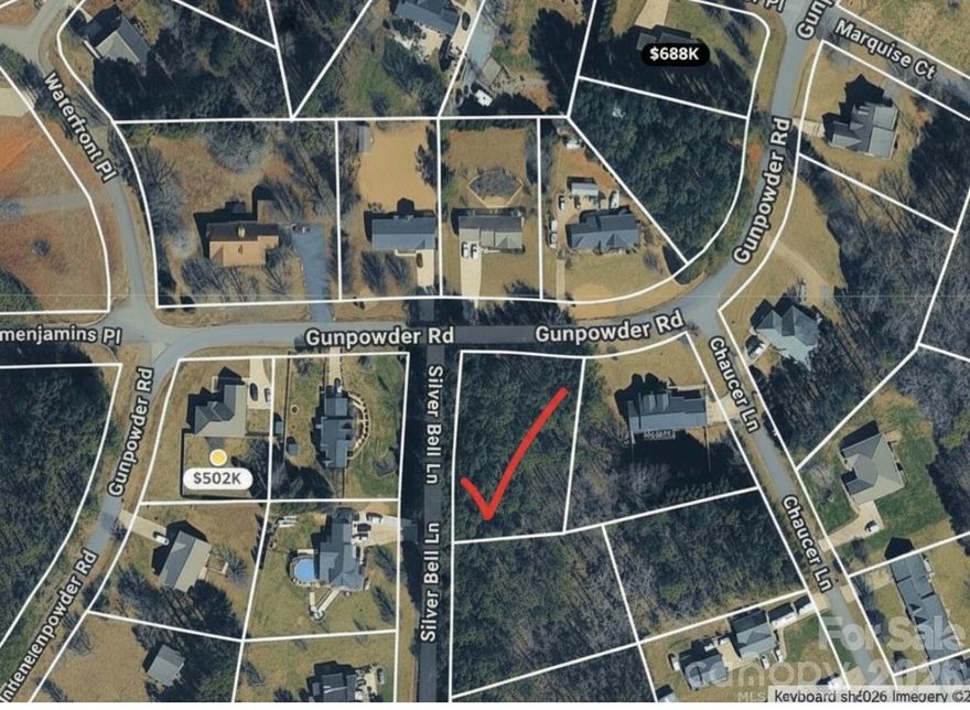 Wooded, buildable lot just a short walk to Lake Rhodhiss. Great opportunity to build your dream home in an established neighborhood with nearby lake access and beautiful natural surroundings.