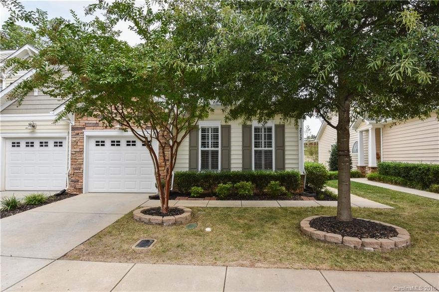 Stunning, beautifully maintained and upgraded one-level townhome in desirable Cobblestone. 2 large bedrooms, two full baths, home office with built-ins, stainless steel appliances, hardwood, ceramic tile, newer carpet, fresh paint, plantation shutters throughout, in-ground irrigation, private rear yard. End unit. Popular Pinehurst plan. Easy access to Ballantyne, I-485 plus low SC taxes. This one won't last long