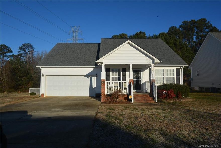 Beautiful 3 bedroom 2 bath home on private lot. High ceilings, open living areas, kitchen with newly painted cabinets, new granite countertops, new tankless water heater and whole house water filtration system. Laminate flooring in kitchen and master bedroom. 2 car garage. Fenced backyard. Great closet spaces! USDA approved financing!