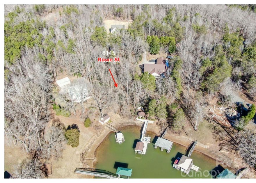 It's a great waterfront lot. Keep some of the beautiful trees and enjoy a quiet country setting on Lake Norman! The community connects to the gorgeous Long Island Airport neighborhood! Close to schools, shopping, and more. Great for building your Lake home.