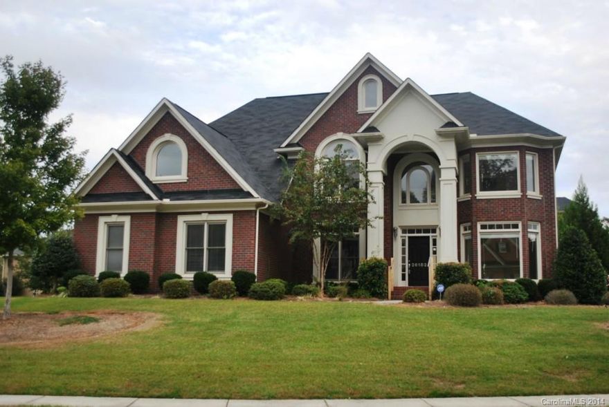 Just beautiful! This popular John Wieland floor plan is a 3 story, five bedroom 4 1/2 bath stunner that has so many updates!  Gorgeous foyer leading to dining and living room for entertaining.  Expansive kitchen with gourmet appliances that opens into a 2 story family room, built-in book shelves and gas fireplace. Master "WING" features a sitting area, large bath with double sinks, separate shower and tub and a separate study or dressing room directly off the bath  This is a Fannie Mae Property.