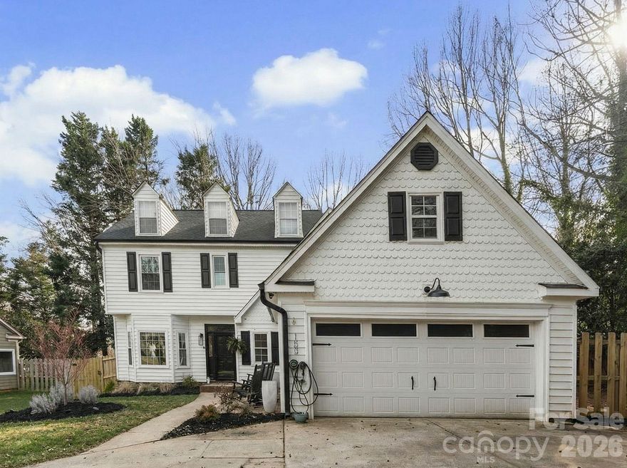 LAKE LIVING WITH DEEDED BOAT SLIP! Located in desirable Bridgeport lakefront community with a deeded boat slip, this beautifully remodeled 3-bedroom, 2.5-bath home offers the perfect blend of modern updates and lifestyle amenities. The fully renovated kitchen (November 2025) is a true showstopper, featuring brand-new soft-close cabinetry, quartz countertops, floating shelves, ceiling-height tile backsplash, stainless steel sink, and sleek Samsung Bespoke appliances. Designed to impress the main level also boasts vaulted ceilings in the living room with a cozy gas fireplace, a stunning vaulted sunroom perfect for year-round enjoyment, and three bay windows that flood the home with natural light. Whether you’re hosting dinner in the dining area, relaxing in the family room, or enjoying a glass of wine at the built-in dry bar, this home delivers warmth and style throughout. Further updates include LVP flooring across the main level and the primary bedroom, designer light fixtures in every room, a 2025 water heater, 2022 roof, 2018 HVAC, and even an electric vehicle charger installed outside the garage — no detail overlooked. Situated on a quiet cul-de-sac with a private backyard, this home offers both tranquility and convenience. In addition to your deeded boat slip, the neighborhood amenities include an outdoor pool, tennis courts, boat storage, boat ramp, and playground! Located minutes from dining, bars, and shopping at Langtree Shopping Center, with easy access to I-77, low Iredell County taxes, and highly rated schools — this is one you don’t want to miss. Schedule your showing today and start living the lake life you’ve been dreaming about!