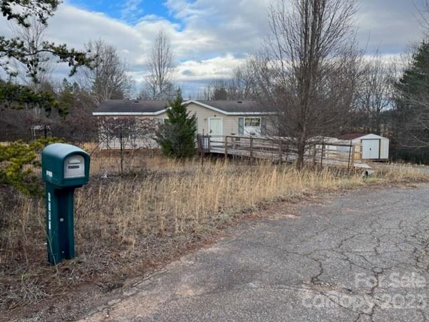 Introducing a promising investment opportunity: a 3-bedroom, 2-bathroom small doublewide resting on an .82-acre lot. This fixer-upper is offered in its current condition, below tax assessment value, presenting an ideal prospect for savvy investors or individuals seeking a customizable living space. home located in quiet neighborhood cul-de-sac less than 5 minutes from interstate 40. All offers are welcomed but this great deal won't last long.