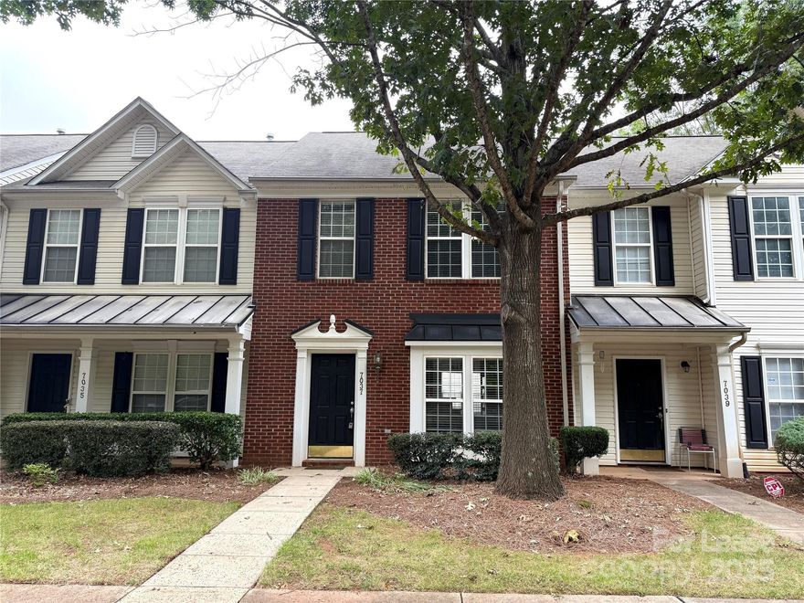 Great Location!Welcome home to this adorable townhome Ready to Move-In!This beautiful floorplan is loaded with several features that will make you fall in love in!Featuring a perfect sized living room with cozy fireplace you can snuggle around while still getting in abundance of sunshine in;Spacious kitchen with all black appliances, tons of cabinet & counter space with a perfect breakfast/dining nook;Master Suite with trey ceiling & ample walk-in closet while stepping into master bath with dual vanity & plenty of cabinet space;Spacious secondary bedroom with it's own full bath.Stunning Laminate & Tile flooring throughout.Don't forget to step out on the rear patio giving you all the privacy while still having additional storage space on your end. Located within Convenient access to UNCC, shopping, restaurants hwy I-485/I-85,Harris Teeter, Target, Home Depot, Lowes, Walmart, CPCC Campus, Transportations, Banks,Parks and gyms. Definitely A Must See!! Won't Last Long So Stop by today!