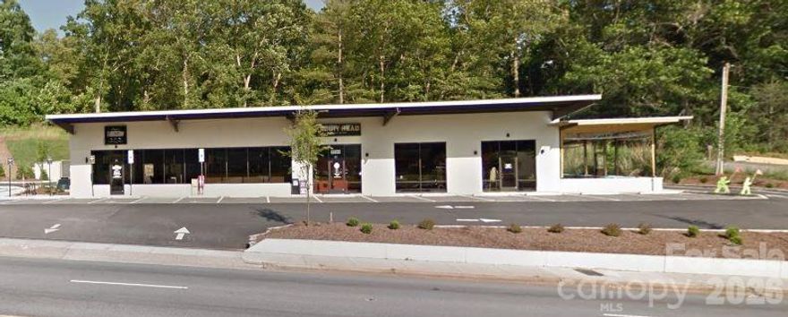 INVESTMENT OPPORTUNITY for a fully leased 2 tenant building directly on Hendersonville Rd.  Tenants are:  Biscuit Head & Studio Chavarria (Barbershop).  Building was completely remodeled in 2018.  Great location, tons of parking and street front signage.  MUST SEE!
