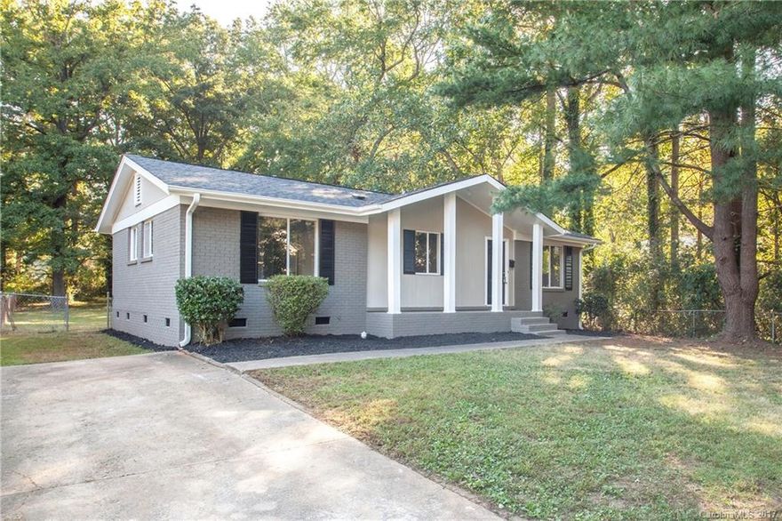 Beautifully renovated home tucked on a quiet street! Nearly a half acre on corner lot with mature trees for privacy! Brand NEW roof and HVAC, stainless steel appliances, granite counter tops and new floors throughout. Your clients will love all of the natural light from the large windows in the living room and master. A quick drive to uptown or university area. Hurry! Such a good opportunity and price.