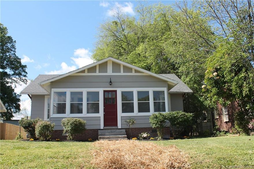 This adorable home has been completely remodeled. Features: A beautiful three season porch on the front, new roof, duct work for  HVAC, plumbing and electrical, hardwood floors throughout, a large secondary bathroom was added to the home, The master is a great size, has a beautiful barn door going into the master closet and a large walk in shower in master suite. The kitchen boasts 42"cabinets with stainless appliances. Back sun room is a great space to enjoy your morning coffee.