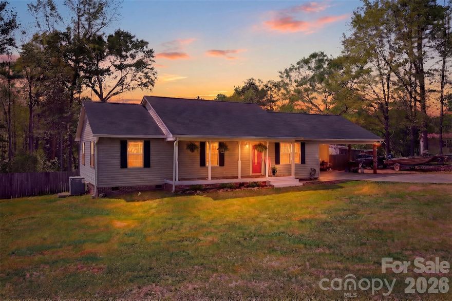 Time to make peaceful country living your reality! Situated on a generously sized lot, this well-maintained home offers space, comfort, and endless possibilities inside and out.

Step onto the inviting front porch and into a spacious living room that flows seamlessly into the dining area, perfect for everyday living and entertaining. Just off the main space, you’ll find an updated half bath and a large laundry room with convenient attic access.

The kitchen is designed for functionality, featuring ample cabinet storage, abundant counter space, and a window overlooking the recently stained back deck, ideal for keeping an eye on outdoor gatherings.

Enjoy year-round relaxation in the enclosed sunroom with direct access to the backyard. Outside, entertain with ease on the expansive deck or cool off in the well-maintained above-ground pool during warm Carolina summers.

The primary suite offers a spacious retreat with a generously sized ensuite bath and dual closets. Two additional bedrooms provide great natural light, comfortable space, and ample storage.

Ideally located just minutes from Fishing Creek Reservoir and conveniently positioned off Highway 21 with easy access to I-77, this home offers the perfect balance of quiet country living and everyday convenience.

Major updates include HVAC (2021), a newer roof, and $5,000 in seller concessions for added peace of mind.