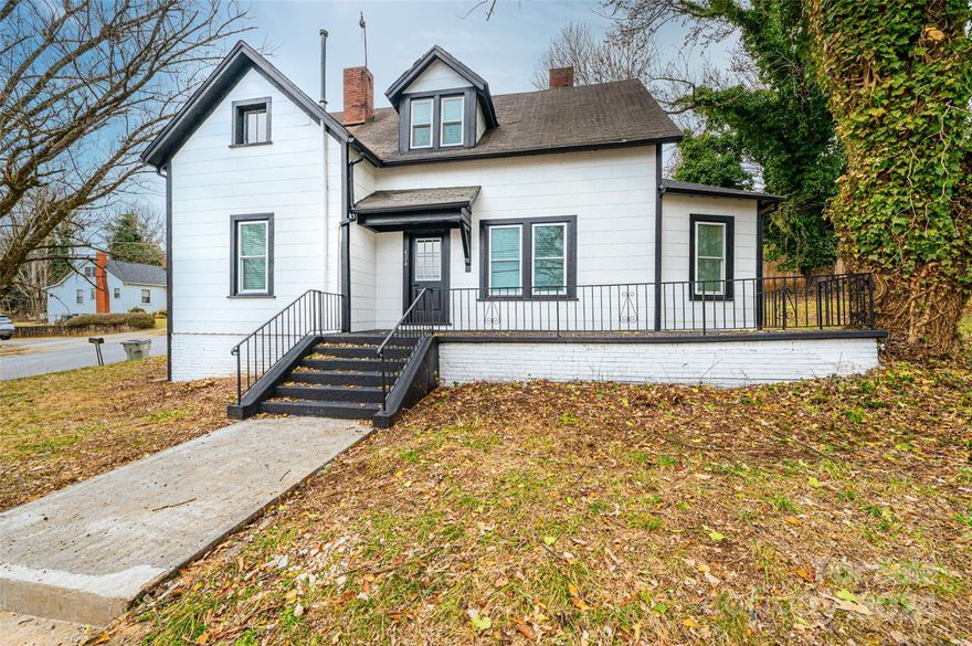 Come enjoy the convenience of living within walking distance to Downtown Lenoir and nearby shopping. The property offers an unbeatable combination of features including corner lot, front porch, and a separate entrance to the second level. The interior presents a remodeled home with updates that include new roof, new paint, new carpet, new windows, large laundry room, new vinyl flooring, walk in shower, granite countertops, new cabinets, new stainless steel appliances and impeccable finishes throughout. The luxurious master bedroom is quite a find. A spacious layout featuring an attached sitting area, which can be used as an office. From the masters bedroom step out the private entrance onto the patio for a breath of fresh air. Last but not least, double your outdoor fun with a great size backyard! Looking for that special place to call home? Come and see this outstanding home at 424 Main Street SW Lenoir, NC and be ready to make an offer!