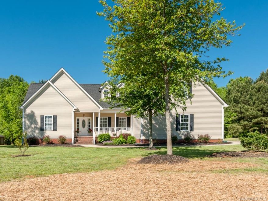 Beautiful & extremely well maintained home located on 1.63 acres! Large screened porch is perfect for relaxing & enjoying the views! Large detached 3 car garage w/ water closet & sink & an attached 2 car garage! Solid oak custom built cabinetry in Kitchen, bathrooms & laundry! Hardwood floors extend throughout entry, dining, great room & kitchen. Gas log fireplace in great room! Cathedral ceiling in bed & great room. Master contains trey ceiling w/ recessed lighting! This home won't last long!