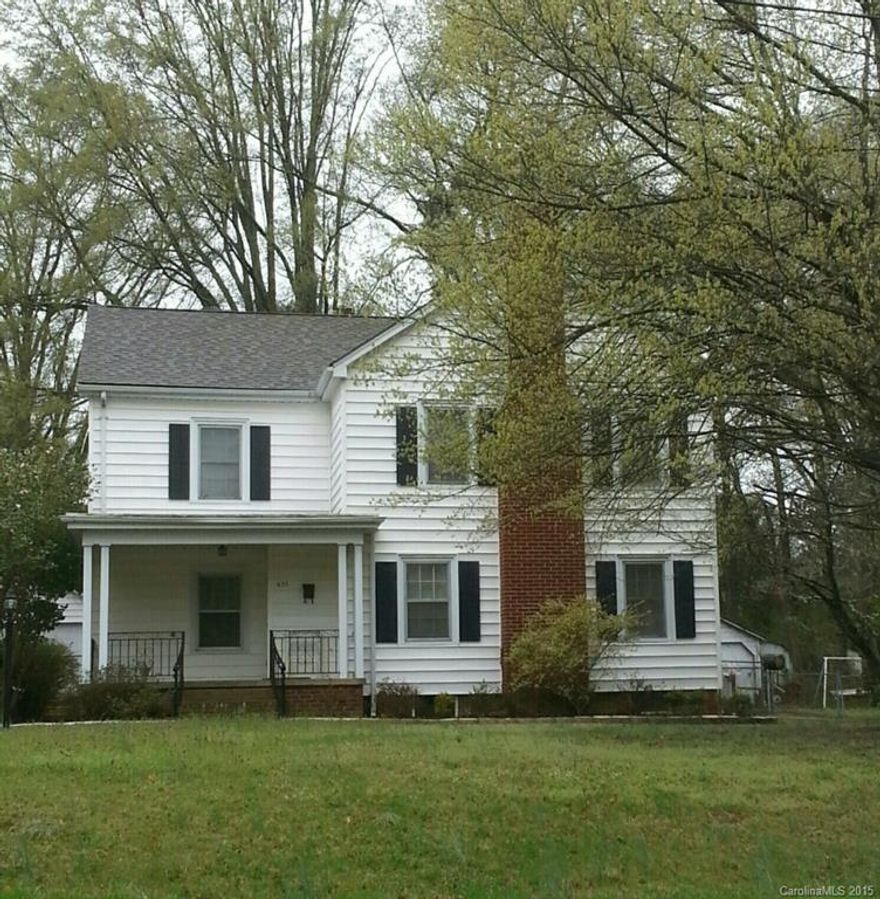 Lovely older home w/5 bedrooms, 2 baths.  Rooms are spacious & filled w/character. Interior doors have glass knobs & skeleton key locks. Lots of wide moldings throughout. Tile surround fireplace in Living Rm, French Door entry to Formal Dining.  Hardwood floors in most bedrooms, new linoleum in kitchen, new neutral carpet & fresh paint throughout.  Roof apprx 3 years old per owner. Excellent location, 2-car detached garage, mature landscaping & fenced back yard make this a home worth a look!