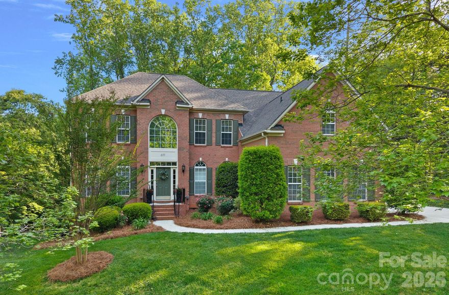 Welcome to this exceptional home in the desirable Cashion Woods community of Huntersville, where spacious lots and elegant living come together beautifully. This impressive property offers 5 bedrooms, 5 bathrooms, and incredible versatility—including a fully finished basement apartment and garage space for up to 5 vehicles.
Step inside to find a thoughtfully designed main level featuring a formal living room, dining room, flex space, sunroom, and a stunning two-story great room filled with natural light from oversized windows. The expansive kitchen is a true centerpiece, complete with granite countertops, tile backsplash, and a large island, all flowing seamlessly into a generous breakfast area. Upstairs, the oversized primary suite is a true retreat, offering a spacious bedroom, spacious bath, and two walk-in closets. Three additional bedrooms complete the upper level.
The fully finished basement apartment is a standout feature, offering its own bedroom, media/flex  room, full kitchen, living area, laundry, and two bathrooms—perfect for extended living or guest accommodations. A massive 400-square-foot storage room adds even more functionality. Additional highlights include central vacuum, a tigerwood exterior deck, and a detached two-car garage. Recent updates include refinished hardwoods on the main level, new hardwood flooring in the sunroom, new carpet in the primary suite, fresh interior paint, updated lighting fixtures, and newer major systems (roof 2019, upper HVAC 2019, basement HVAC 2015).
Conveniently located near shopping, dining, highways, and Birkdale Village, this home offers both convenience and accessibility. Note: Basement reconfiguration (including added rooms and bathrooms) was completed without permits but was done in a professional, workmanlike manner. Schedule your showing today and discover everything this remarkable home has to offer!