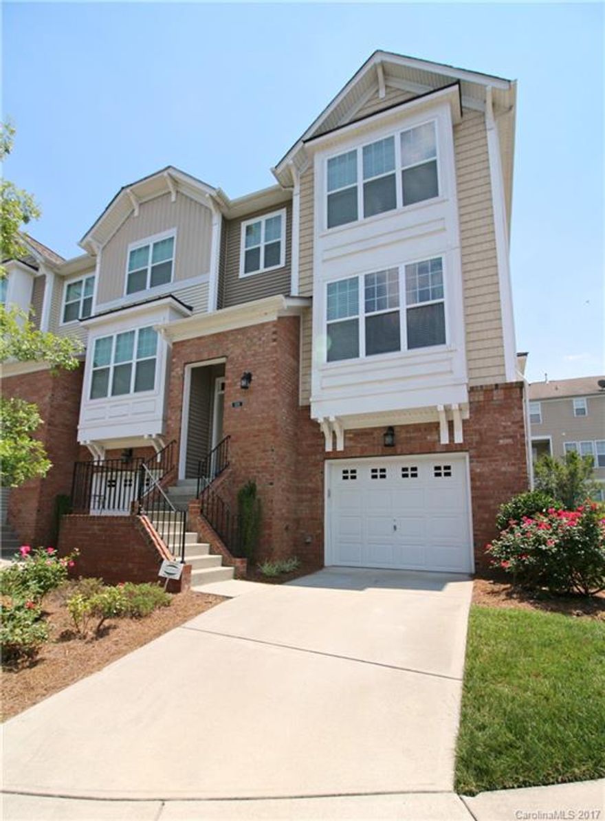 END UNIT!!  Don't miss out on this beautiful 3-story Skybrook Townhome located just across from the amenities center.  Lower level bedroom/bonus with full bath.  Open and spacious living area with dining, kitchen and great room with fireplace.  Inviting Owner's suite with spacious, spa-like bath.   Minutes to I-85 and I-485.  Priced at just $227,900.