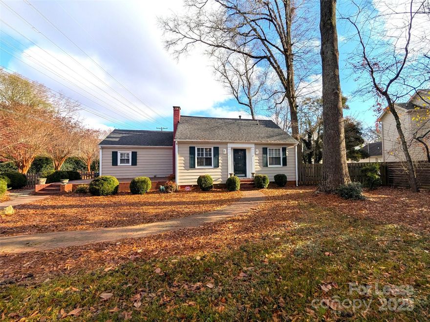 Charming home in great Sedgefield location on large private lot! This beautiful 1940s home has great kitchen and bath updates while retaining lots of pretty craftsman finishing details. Gorgeous kitchen with wood shaker cabinets, granite countertops, tile backsplash and upgraded stainless steel appliances, including French door refrigerator. Separate dining room. Huge family room with lots of windows overlooking the back deck and gorgeous wood floors. Big front living room with pretty fireplace (decorative only!). Bedrooms both have walk in closets. First full bath has been updated with marble look subway tile surround, walk-in shower, frameless glass shower doors and updated vanity/lighting. Second full bath has tub/bath combination and updated vanity. Pretty gravel driveway will accomodate off street parking for 3-4 cars. Large back deck overlooks fully fenced in, very private back yard. Shed for lots of extra storage. Walking distance to South Blvd!