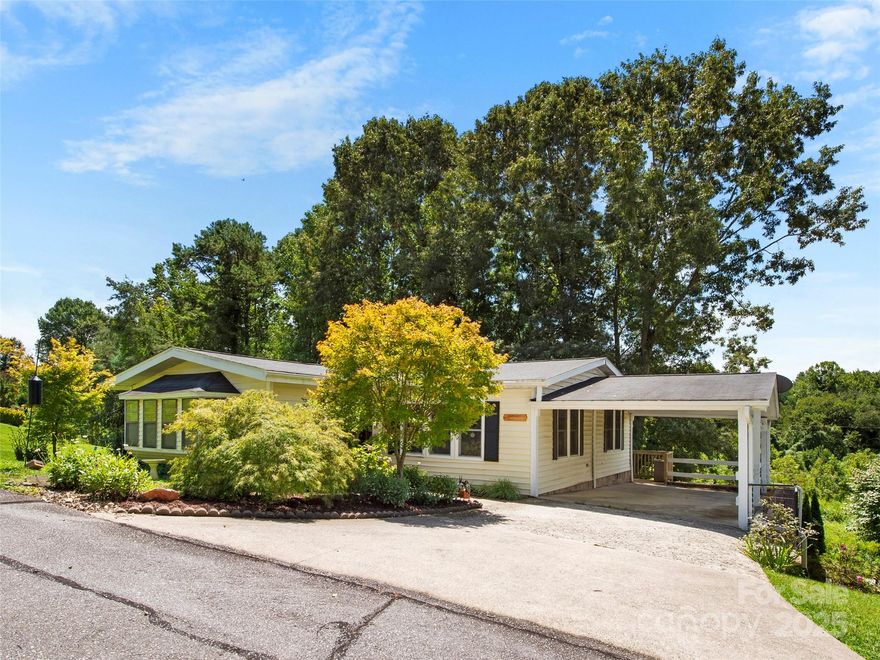 Welcome to 200 Cranbrook Circle! Boasting the largest floor plan in Cumberland Village, this home offers easy single-level living and a beautifully renovated kitchen with new cabinets, flooring, appliances, and granite countertops. A brand-new split HVAC system also provides year-round comfort in the inviting sunroom. Cumberland Village is known for its warm, close-knit atmosphere, complete with a clubhouse and pool where neighbors quickly become friends. A low HOA fee covers lawn care, trash pickup, and road maintenance. Ideally located, this 55+ community is just minutes from shopping, downtown Hendersonville, and medical facilities. Don’t miss this rare opportunity to own one of the most spacious and desirable homes in this sought-after neighborhood!