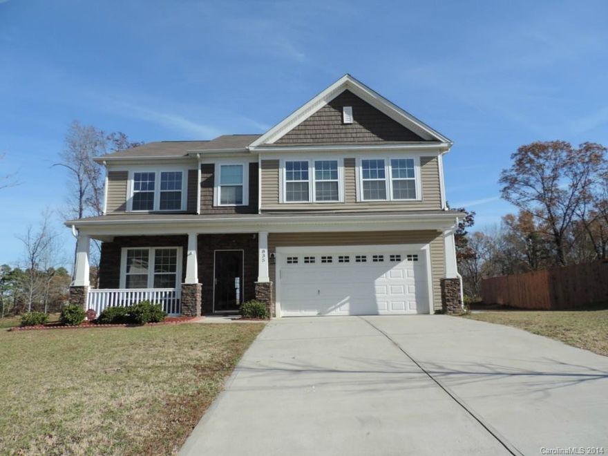 Spacious Home within the Desirable Fort Mill School System. Filled with Natural Light. Gleaming Bamboo Hardwood flooring on Main. Chair Rail and Crown Moulding in Dining Room. Kitchen has Stainless Steel Appliances, Granite countertop, Tile backsplash and Breakfast bar. Bedroom or Office on Lower level. Loft provide additional family living area. Security camera gives view of the front door. Huge Lot backs up to woods for extra privacy. Tons of storage. Minutes from the Hwy and Pineville.