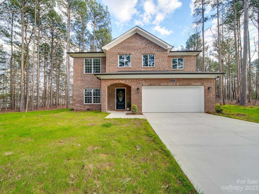 This residence is a rare find in its price range, boasting a full-brick exterior. Three bedrooms, an additional bonus room,  a spacious loft, the thoughtfully designed open floor plan provides flexibility and ample living space  Enjoy the perfect blend of formal and casual dining with a designated dining room and a breakfast area. This home is not only aesthetically pleasing but also conveniently located, offering easy access to various amenities including Monroe, Uptown Charlotte, fine dining and shopping..One of its standout features is its proximity to the highly sought-after Porter Ridge Schools. No HOA is a perk!  The generously sized .73-acre lot provides ample outdoor space, making this home an ideal setting for entertaining gatherings with both family and friends. Enjoy the perfect blend of indoor and outdoor living, creating lasting memories in a home designed for both style and practicality. Seller offers a 1 year warranty.  Survey in attachments.