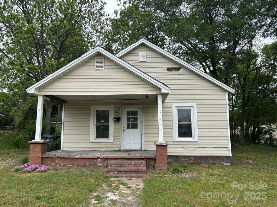 Investment Opportunity!  Located on a roomy .29 acre lot only steps from main street, this single-family home offers potential and location value.  Located in the city limits, this single family home is zoned commercial but can be used for residential purposes. Please contact Town of Dallas for clarification of use.