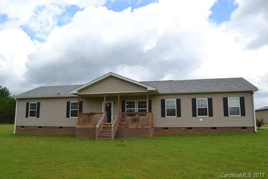 What a beautiful home with tons of elbow room!  Split bedroom plan, master bedroom is huge and bath is incredible with huge walk-in shower, garden tub, water closet and double vanity.  Large kitchen with tile back splash and tons of cabinets and counter space.  Great open floor plan.  Bonus room and office area!  Sits on 7.5 acres and has a detached garage/workshop!