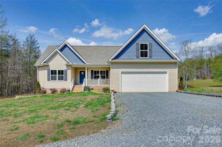 Tucked away on 37 unrestricted acres in the rolling foothills of North Carolina, this extraordinary homestead offers the rare combination of a brand-new custom home, income-producing potential, and a landscape so rich in character it practically tells its own story. Built in 2024, this 2,144 sq. ft. craftsman-quality residence features 3 bedrooms, 2 bathrooms, a bonus room, and a 2-car attached garage, all sitting above a spacious crawl space with 8-foot walls ready to be transformed into a workshop, root cellar, or finished basement. Three-zone HVAC keeps every corner of the home comfortable year-round, including dedicated systems for the primary suite, bonus room, and main living area, while a storage room over the garage adds even more functionality. Car enthusiasts, contractors, and hobbyists will be thrilled by the massive 1,620 sq. ft. detached 4-bay garage, complete with two 16-foot roll-up doors, spray foam insulation, and a wood-burning stove, creating a comfortable and efficient workspace year-round. One bay has already been converted into a private in-law suite or rental unit, offering immediate income potential, and a chicken coop rounds out the working infrastructure of the property. Near the main road sits a second RV lot or future homesite already equipped with its own power, septic, and water hookups. Perfect for extended family, a guest cottage, rental income, or a future build. 
This is where the property truly shines. A year-round creek winds the entire length of the property parallel to Terry Road before feeding into historic Puzzle Creek. Multiple ATV, motorcycle, and horse trails crisscross the acreage, kept neatly mowed in season, and connect to neighboring riding trails beyond the property line. Eight acres surrounding the home are enclosed with underground fencing, ideal for dogs or livestock. The land is a forager’s and farmer’s dream with two apple trees, peach and pear trees, a blueberry bush, fig bush, loads of wild blackberries, a flower garden bursting with rose bushes and annuals, and stunning peony and evergreen plantings. A potential natural spring near the base of the driveway awaits confirmation, adding even more value to this already remarkable property. Hunters will appreciate that the property previously operated as a hunting lease and includes two enclosed deer stands. Whitetail deer, wild turkey, and coyote are frequent visitors, and the occasional black bear has been spotted nearby. The creek bottom and hardwood timber create ideal habitat and natural funnels. For the history buff and the adventurer alike, Puzzle Creek carries the lore of Abraham Lincoln’s earliest childhood home site, marked nearby and celebrated at a museum in Bostic. Just beyond the property line, a cluster of rock-piled grave sites believed to date back to Civil War soldiers, Native American, or early settlers adds a fascinating historical element. Exposed bedrock along the creek also offers opportunities for recreational gold panning. Enjoy peace, privacy, and star-filled skies while still being just 15–20 minutes from the shops, restaurants, and conveniences of Shelby, Forest City, Rutherfordton, and Spindale. No restrictions. No HOA. Hunt it, farm it, or build your private compound—this is land that truly lets you live life on your terms.