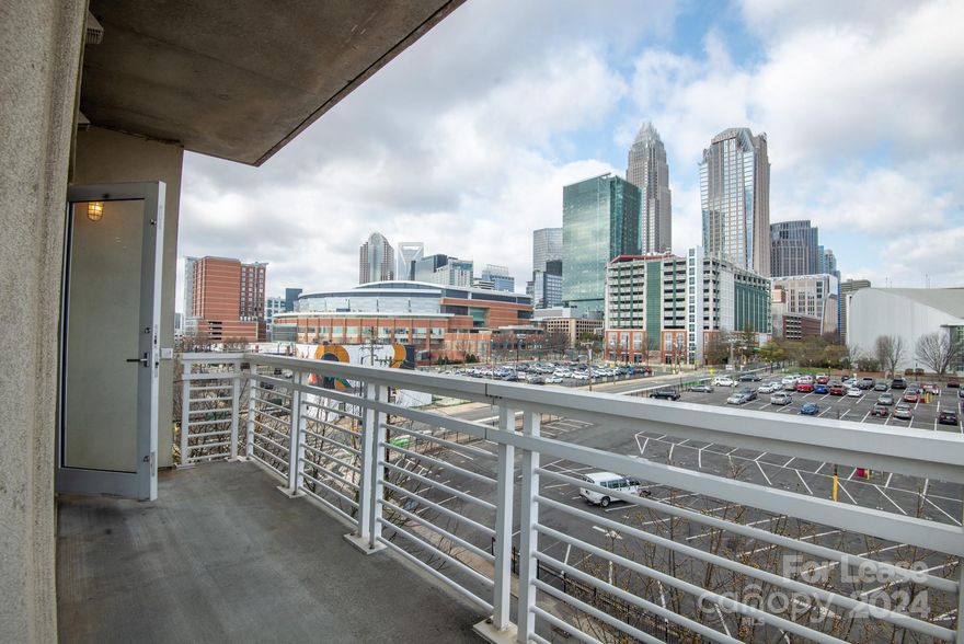 Welcome to your new pet-friendly home in the heart of Uptown Charlotte! Just steps away from the light rail, best restaurants, shopping, and entertainment. The condo features beautiful hardwood floors in the main areas, 10 ft. ceilings, and floor-to-ceiling windows that provide stunning views of the city skyline and natural light. The kitchen has granite countertops, SS appliances, a pantry, ample cabinets, and counter space. The primary bedroom features an en-suite bath with a step-in shower and granite countertop with a double sink vanity. Nice sized 2nd bedroom with full hall bath. In-unit washer/dryer included. Google Fiber ready. Two reserved garage spaces are just steps away from the unit. Water/sewer, trash, and recycling included. Pets conditional. **No Cats** 

The Building has a rooftop grill area, a garage bike rack, and an Amazon Hub package locker for secure delivery and notification.