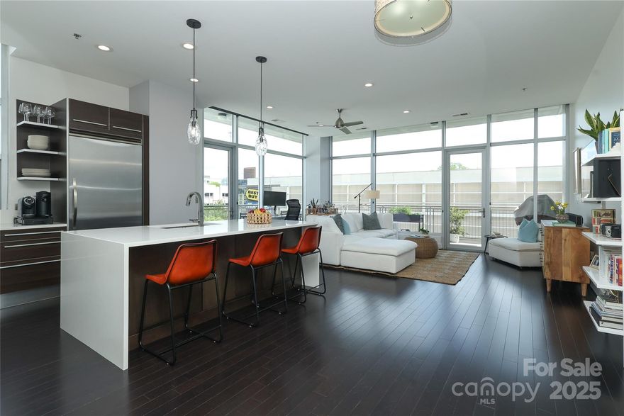 Enjoy city living at its best in this beautifully renovated 1-bedroom corner unit at The Metropolitan. This sun-drenched condo features a spacious open layout with updated finishes and a rare wraparound porch offering spectacular city views. Beautiful kitchen w/ quartz waterfall island with hidden storage & SS Viking appliances. 
 Other features include a spa bathroom, high ceilings, floor to ceiling windows, roller shades, & additional built-in storage in Primary bedroom.  Washer/dryer and Viking grill remain.  Located in a secure building, residents enjoy top-tier amenities including private rooftop pool, club house, fitness center, and secure parking. Convenient storage closet was paid in full for '25 (3A), can be renewed.  With an unbeatable location and easy access to dining, shopping, Greenway, and Uptown, this condo is perfect for anyone looking for modern comforts & low-maintenance living in the heart of the city.  Don’t miss this rare opportunity—schedule your showing today!