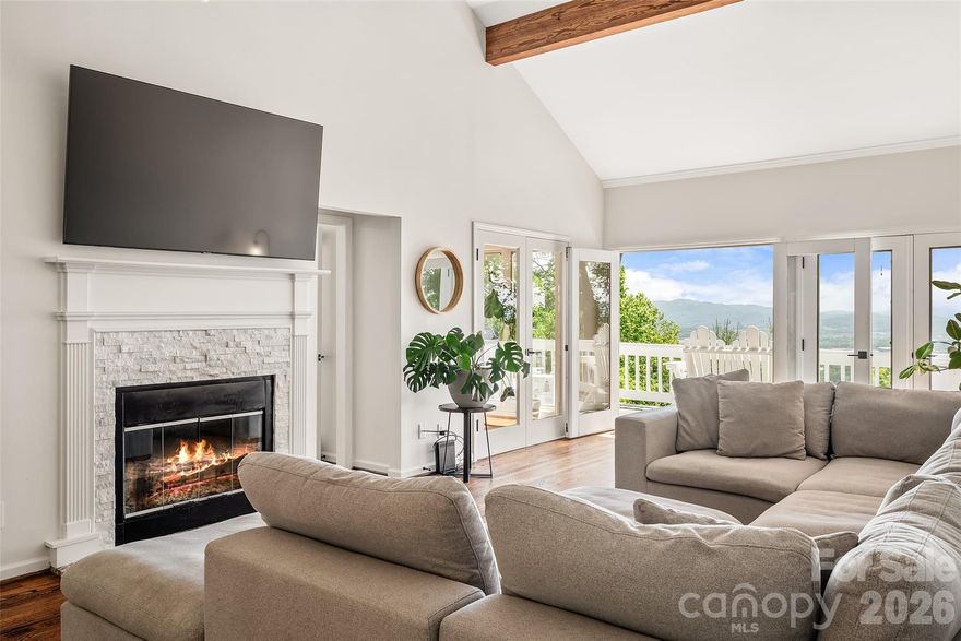 Views like this don't come around often. The moment you step through the front door of this stunning High Vista home, the Blue Ridge Mountains fill the window — it's one of those wow moments you never get tired of.
What makes this property so special is that even with the elevation giving you those jaw-dropping views, you still have a flat yard with room for a playground. That's rare in the mountains. Long-range southeast-facing views with sunrises that will make your jaw drop — and you get them from nearly every room in the house. Inside you've got 3 bedrooms and 3 bathrooms, 4 sets of French doors, 2 wood-burning fireplaces, a sunroom/office, a finished basement, and an extra large primary suite with a luxurious bath. Head downstairs and you've got a additional room and full bath in the lower-level basement, perfect for guests, playroom or a home gym.
High Vista is a gated community with a golf course, clubhouse, and pool — and the sellers are offering a transferable pool membership. This is not just a home, it is a lifestyle. And the location? Perfectly tucked into the mountains but less than 30 minutes to Asheville, Hendersonville, and Brevard.