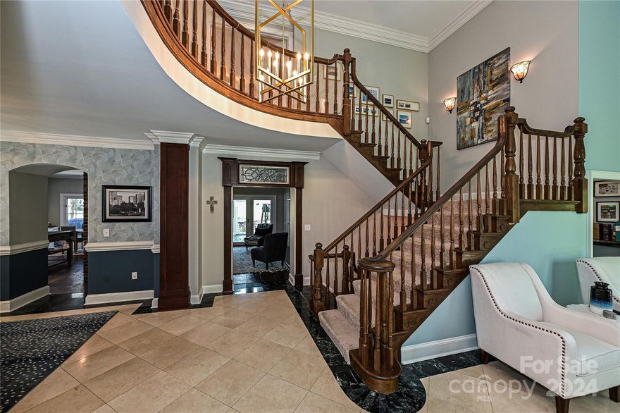 Come home to a resort everyday! That's the River Hills motto. You are buying more than a home, it is a lifestyle. This has anything & everything you need. Entertaining space galore, movie room, wet bar, all season room, wine cellar, even a secret passageway! Main floor features dramatic foyer w/wood accents, floor to ceiling windows, dining room fit for a queen. Well equipped kitchen w/brick encased gas cooktop & bar. Main can be set up for multi-generational living w/2 guest rooms & walk in shower. Sunroom has stunning stacked stone fireplace & overlooks award winning golf course. Move in time for summers in your Pebbletec salt water pool & outdoor kitchen. Upstairs has 3 large bedrooms all w/walk in closets & each w/their own en suite.  Large private office off primary w/gas fireplace & separate storage or workout space.  Bonus room has direct access from 3 car garage & fully functioning utility room offering guest fridge, 2nd laundry & more storage! Watch video https://rb.gy/i0e1uc