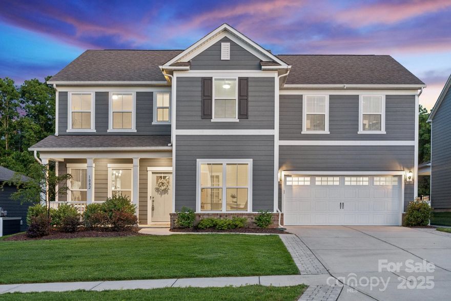 This spectacular home boasts 4 spacious bedrooms and 3.5 bathrooms. If open concept living is your preference, you'll love this functional floor plan, featuring a welcoming living room with a stone gas fireplace, primary suite, laundry, planning center, flex space, and home office on the main level. The gourmet kitchen shines with stainless steel appliances, a farmhouse sink, soft-close drawers, and under-cabinet lighting. A butler's pantry with wine storage + a beverage fridge enhances the appeal. Entertain guests outside under the expanse of the travertine extended patio + pergola, overlooking a tranquil nature backdrop. The 2nd floor offers an incredible custom movie room with all the bells and whistles, plus 3 well-sized bedrooms & a versatile loft, providing ample space for work + play. Living in McCullough offers a highly amenity-rich lifestyle and access to award-winning Fort Mill schools. Envision your new beginning in this sensational, fully upgraded Fort Mill opportunity.