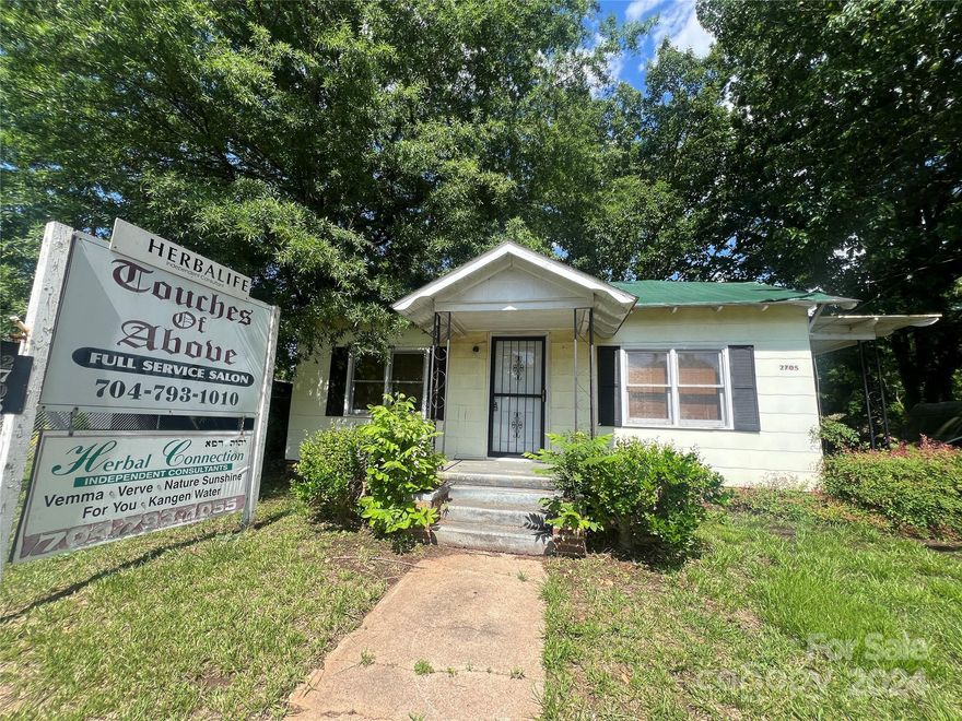Welcome to your new business location in the heart of Concord, North Carolina! This commercial real estate gem is waiting for you to bring it back to life. Located in a bustling part of town, this property offers endless opportunities for business owners. With a little TLC, this hidden gem can become the perfect space for your venture to thrive. Don't miss out on this fantastic opportunity! Come take a look today and make this space your own.